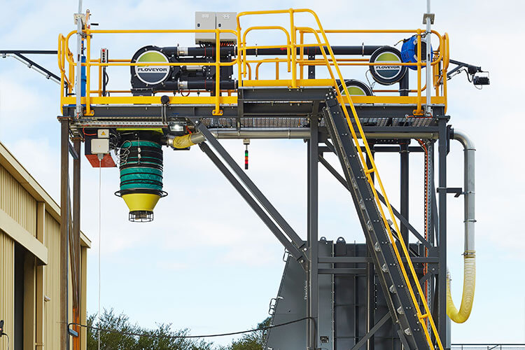 A Floveyor truck loader with top access frame for safe maintenance access