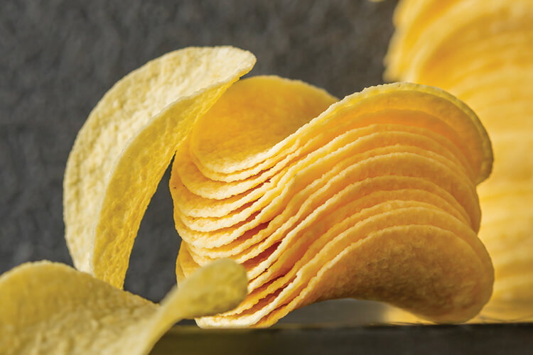 A small pile of potato wafers, made from potato flakes