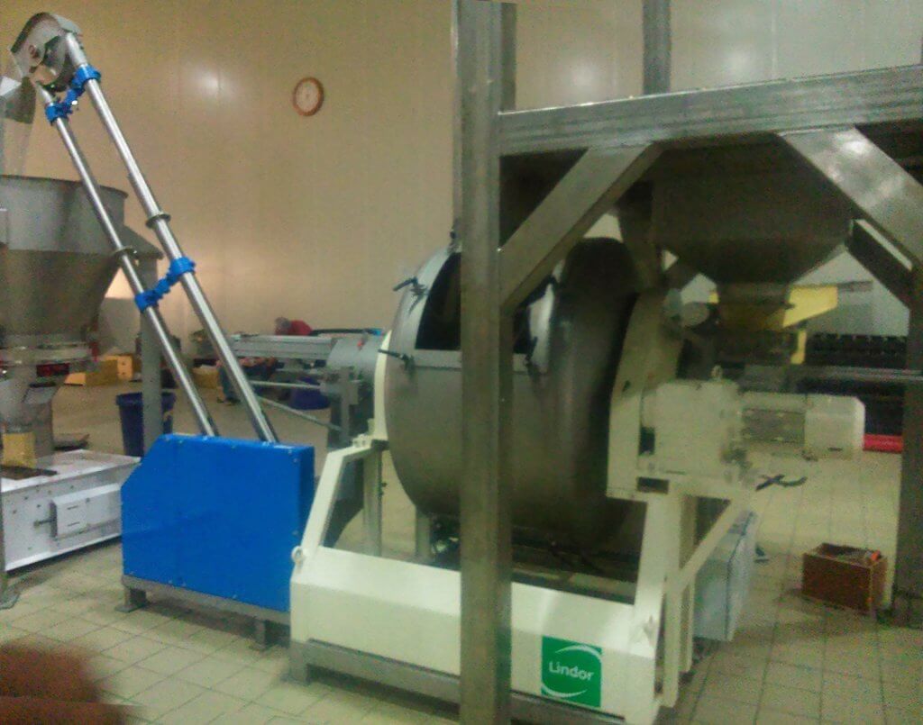 Floveyor aero-mechanical conveying system for Balaji Wafers for transferring potato flakes, powders and a range of granulated ingredients to the mixer